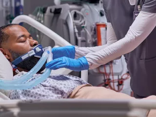 Clinician performs Therapeutic plasma exchange (TPE) at the patient's bedside